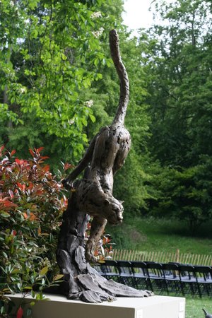 Hamish Mackie's 'Bronze Leopard Life Size Coming out of tree' Hamish Mackie bronze garden sculpture